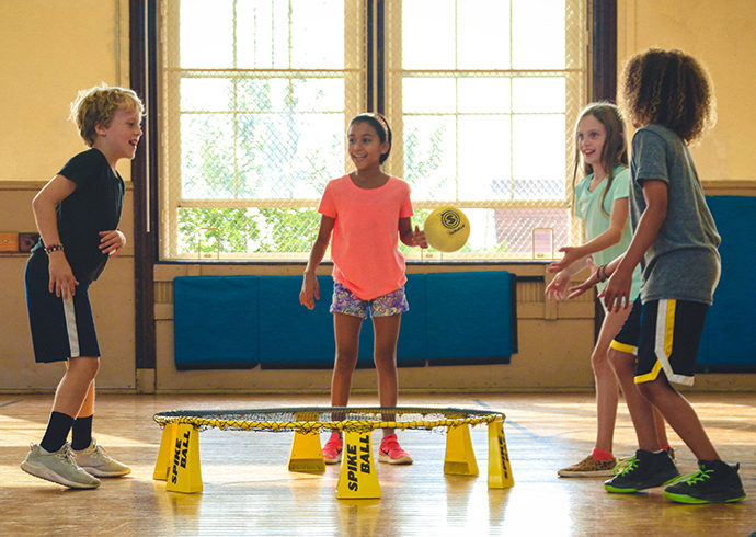 Kids playing in a gym