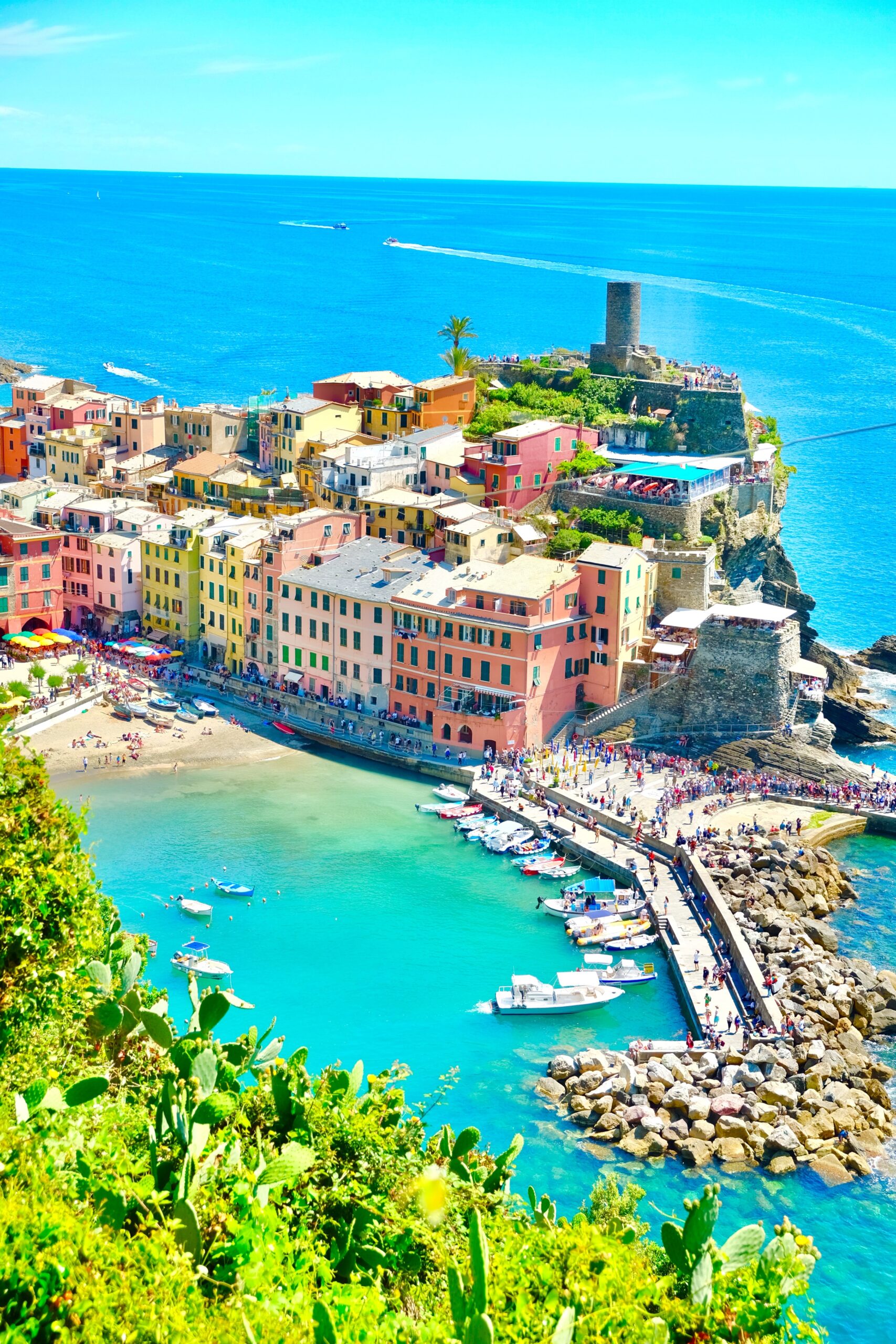 Sunny coast in Europe with old buildings next to the sea